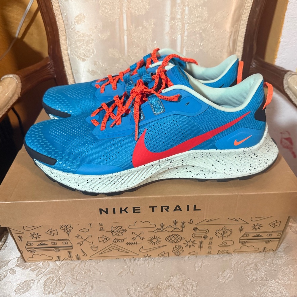 Nike Teal Blue Running Shoes with Red Accents